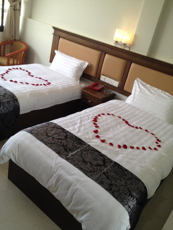 Hotel Myitkyinā Pokoj fotografie
